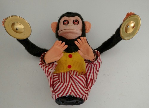 vintage clapping monkey
